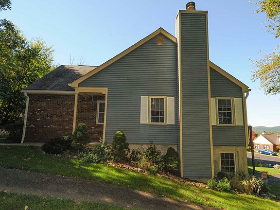 Pristine & Updated Sun Filled End Unit