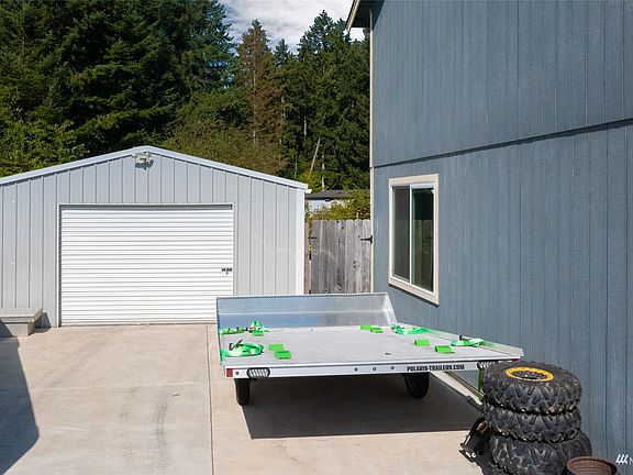 There's great RV parking with cement pad off your detached shop - bring all your toys!>