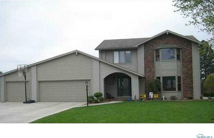 Exterior Front. 3 Car Garage!