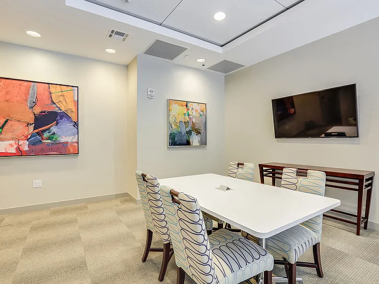 Private conference rooms with flat screen TVs