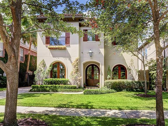 Stucco home with tile roof