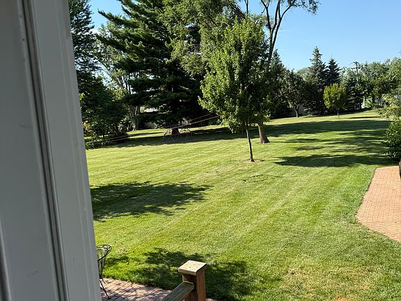 View of back yard from screen porch.