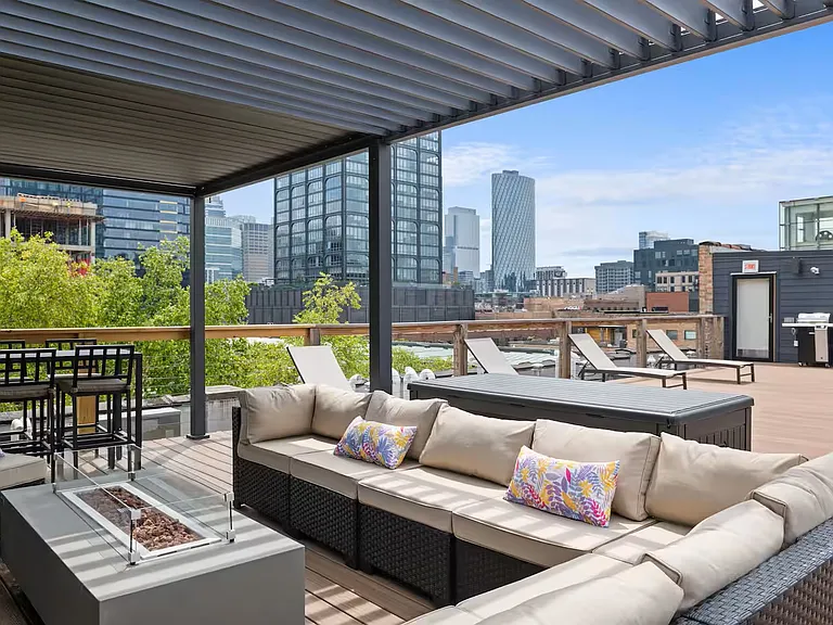 Roof Deck seating area. Fire pit and TV.