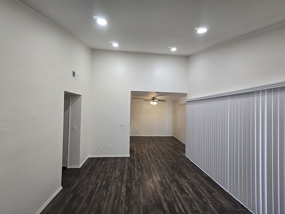 view of living room and dining room. Huge sliding door to patio.