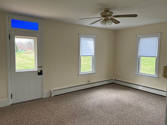 Living room with porch to backyard