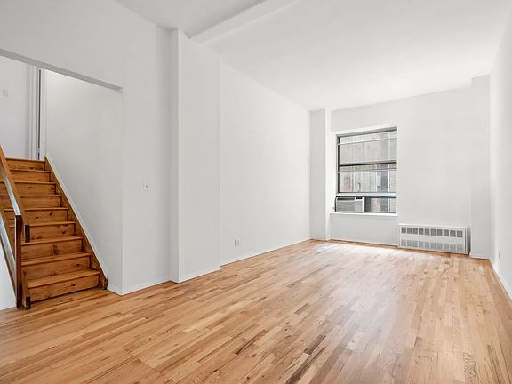 3rd image of 23 E 10th St APT 404