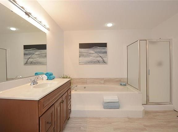Recently remodeled master bath with separate Jacuzzi bath and shower.