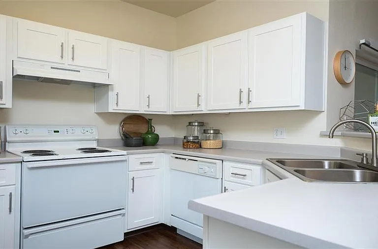 Village at Main Street | Spacious Kitchen with White Cabinetry and White Appliances