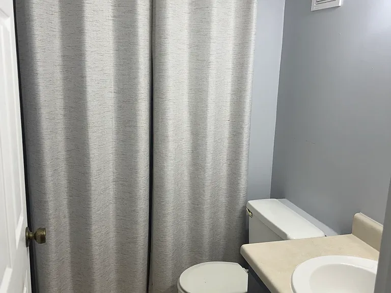 main floor half bath with laundry