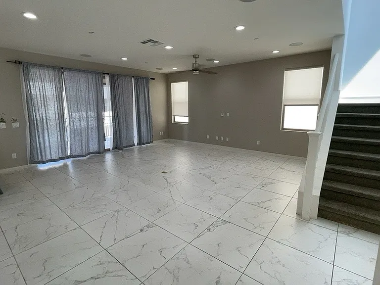 2nd floor - Great room - Kitchen, living room, under-stair storage, bathroom, balcony/patio