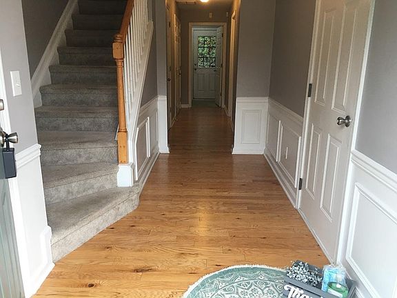 Entrance level- Office/Laundry/1 half bath/walkout patio