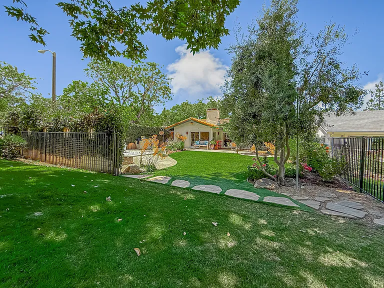 View of backyard from greenbelt