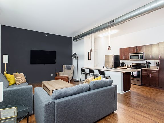 1182 sq feet Open Floor Plan.... High Ceilings... Stainless Appliance Package....