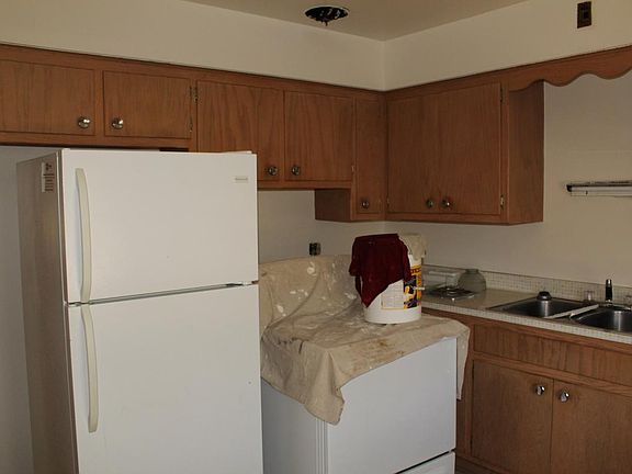 Kitchen 1 Refrigerator and Stove (pardon our mess, we're get