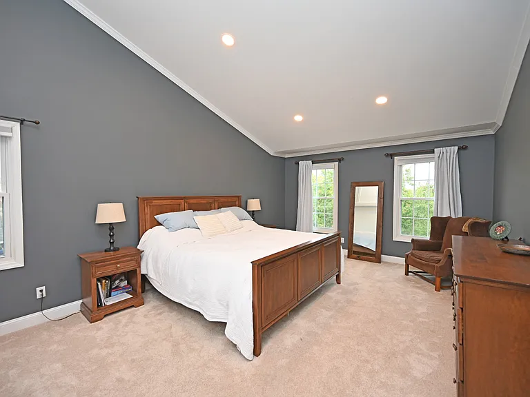 Master bedroom with vaulted ceiling