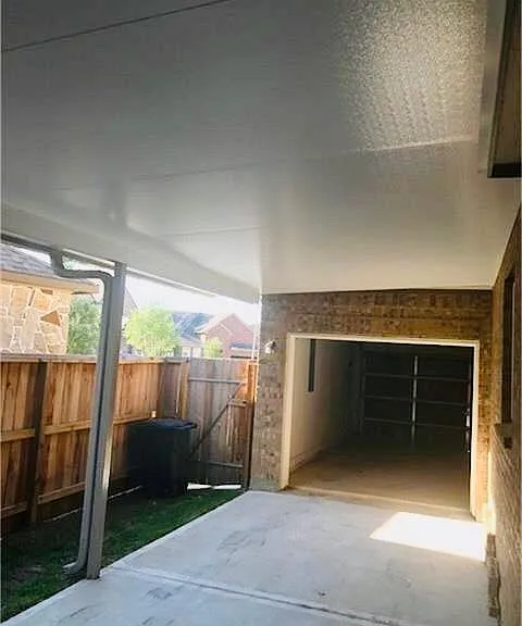 Rear garage door for additional covered parking up to 5 cars total
