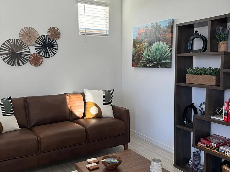 Separate Sitting Room with couch that can be made out to a queen sized bed