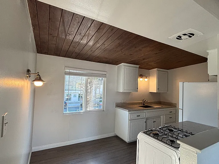 Kitchen overlooks Del Prado Street