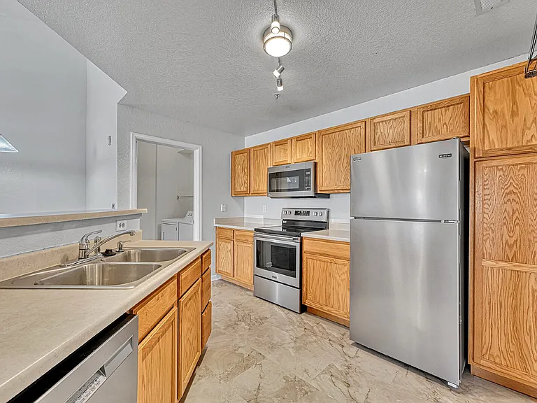 5745 N Genoa Way #13-303 — Photo 1