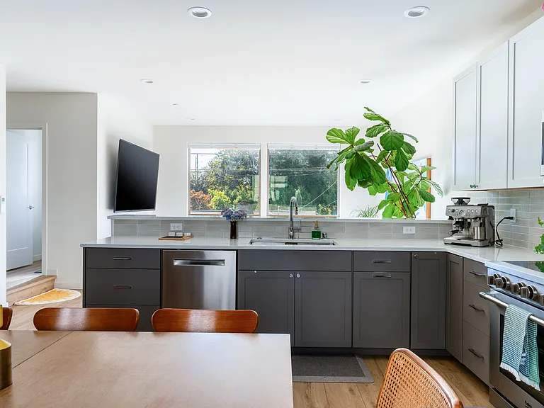 Lots of kitchen counter space. Powder room available on back left for convenience and guests.