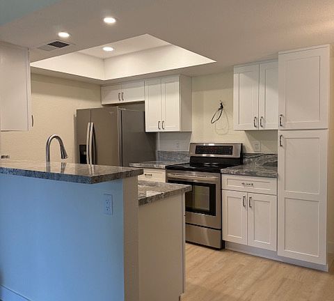 Microwave and cabinet to be installed.