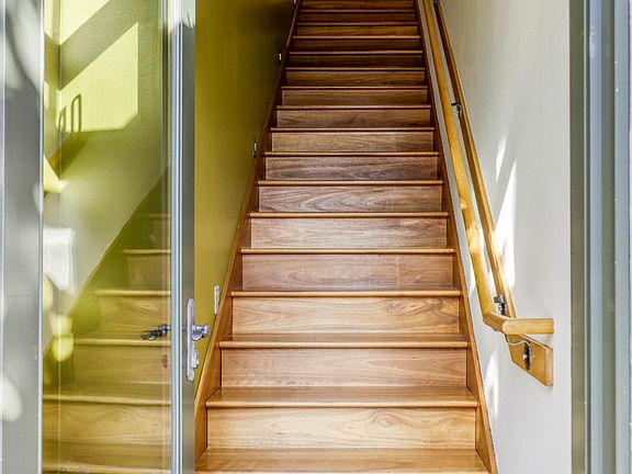 Entryway with radiant heated floor to keep your shoes and coats warm.
