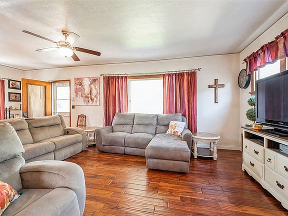 Bright living room with hardwood flooring