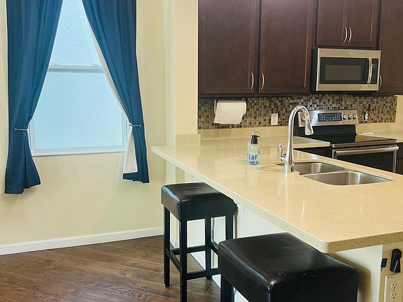 5th image of 8029 Valencia Blossom Way