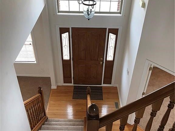 Grand two-story entrance.