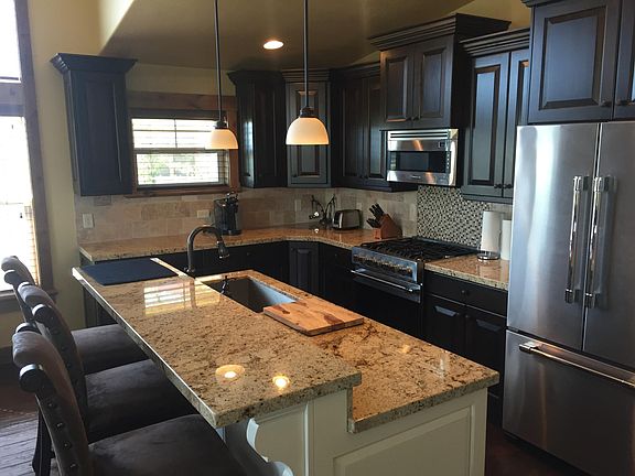 Kitchen with Three Bar Stools