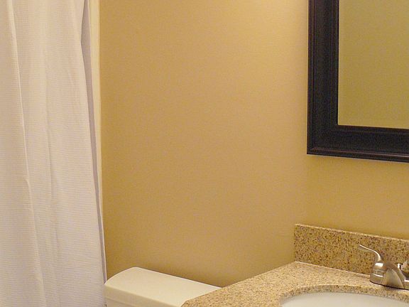 Hall Bath offers new tile,cabiner w/granite & more