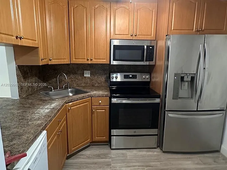 5950 NW 25th Pl #233 — Photo 10