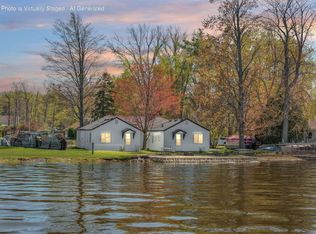 306 Festival Ave, Houghton Lake, MI 48629