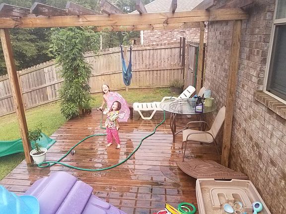 Lower portion of back deck with pergola