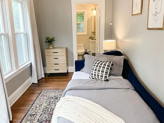 Relax in the comfort of the first-floor bedroom, complete with an adjacent full bathroom for your convenience.