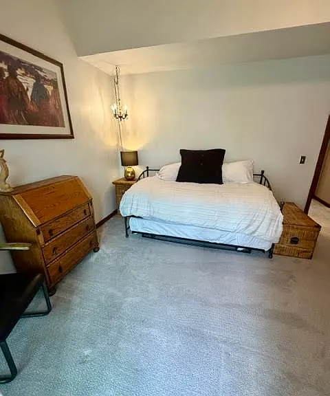Second Story Bedroom with a Trundle Bed that goes from a Twin to a King Bed and a balcony with views of Park City Mountain Resort.