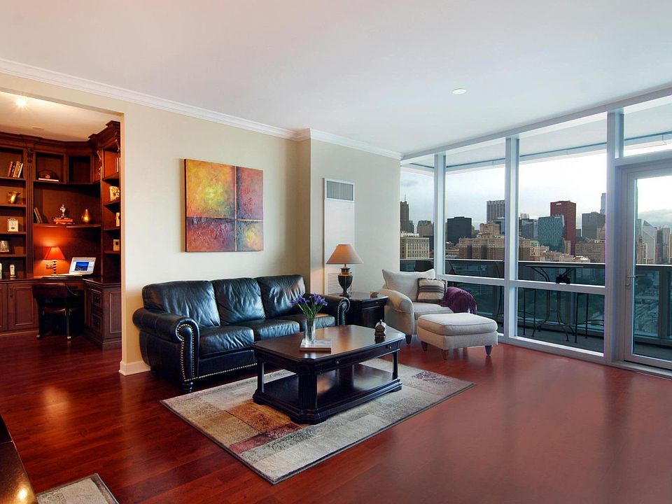 Living Room with spectacular city and lake views