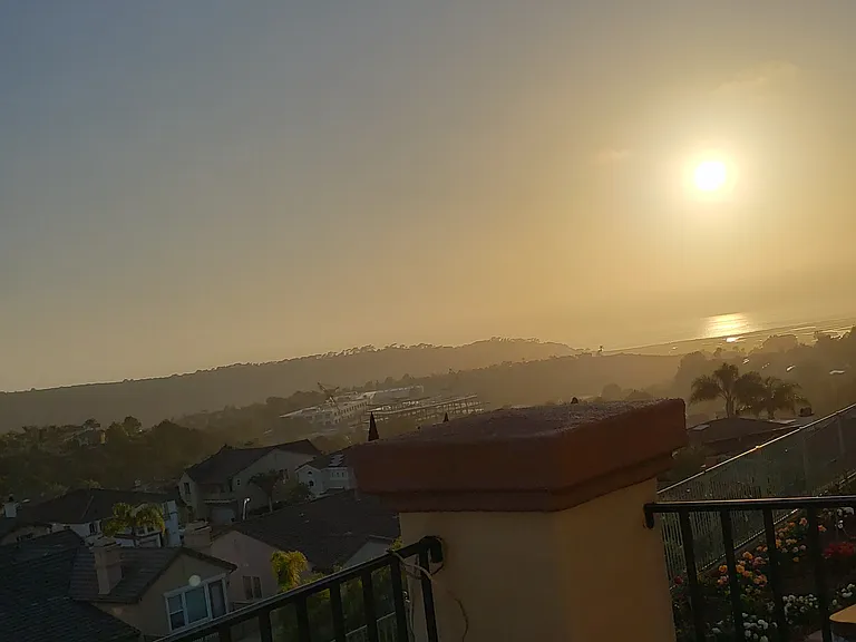 Sunset over the ocean view from your Balcony and Primary bedroom.