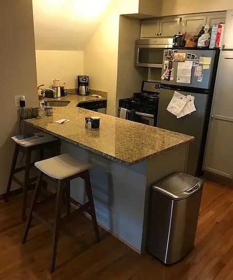5044 Commonwealth 3rd fl kitchen ,custom cabinets, granite countertops and stainless steel appliances