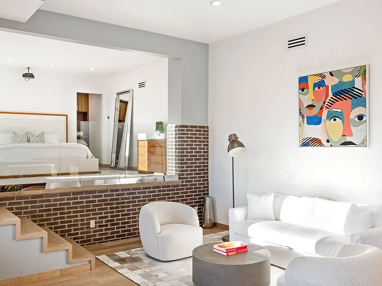 Unwind in the chic living space of Guest Bedroom #3, offering a perfect blend of elegance and comfort.
