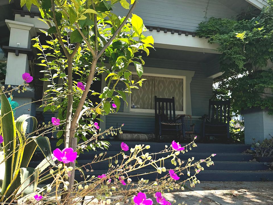 Ample front porch allows room for cozy rocking chairs (available to be included with the house). Enjoy a drink after a long day and chat with the neighbors as they play with kids, walk their pets or just come by to welcome you to the neighborhood.