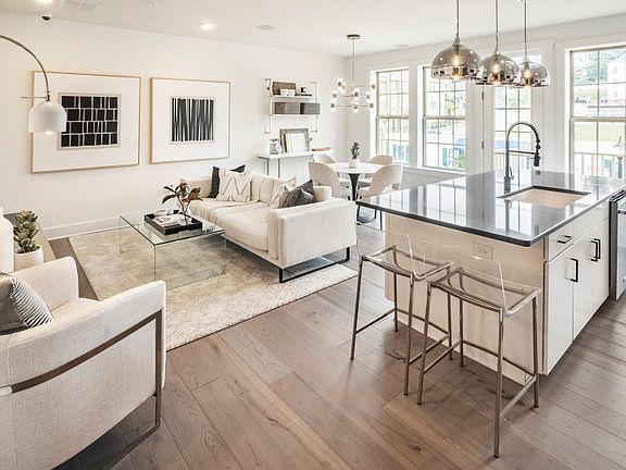 Lots of natural light throughout main living level - Model Representation