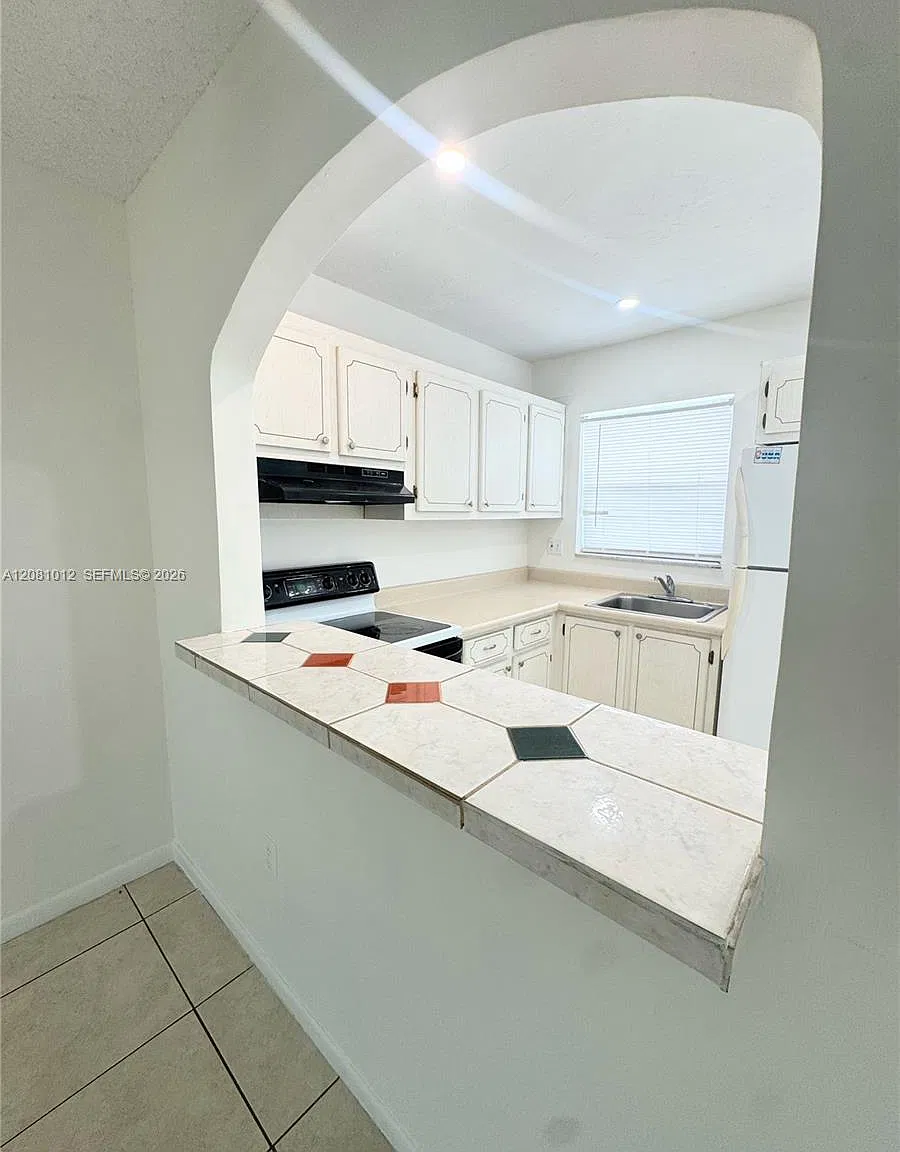 8220 Sunrise Lakes Blvd — Photo 3