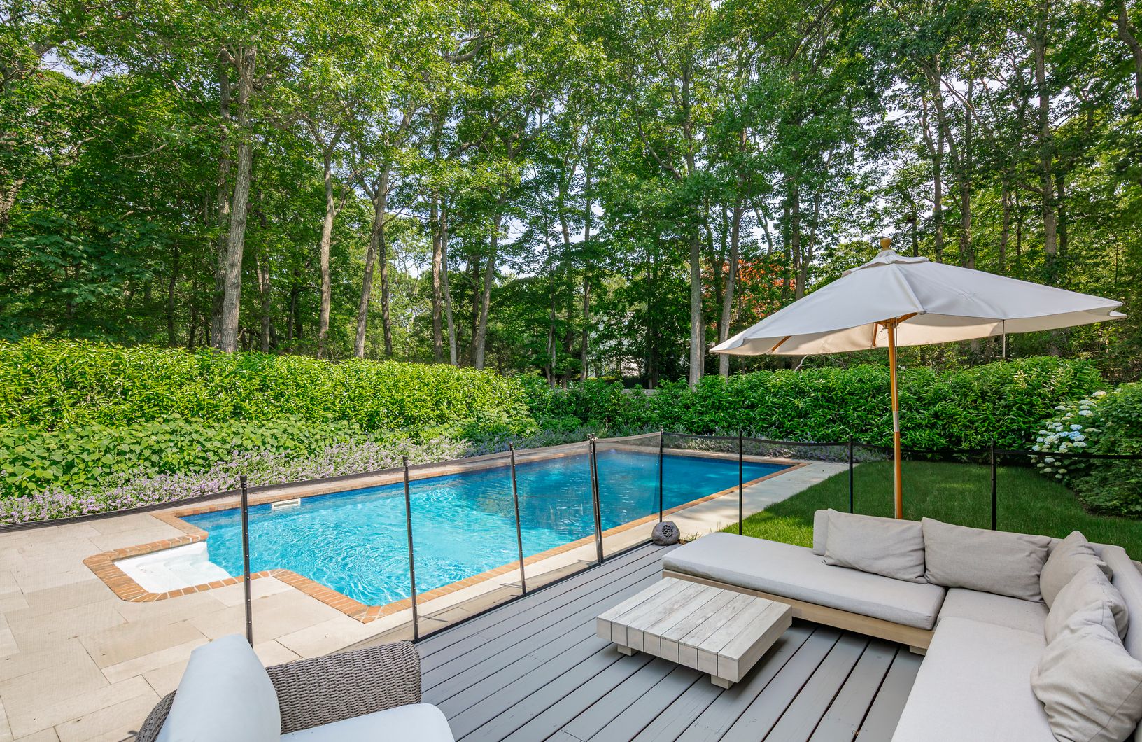  Expansive deck with inviting lounge area
