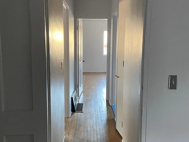 further down the hallway looking into the front room