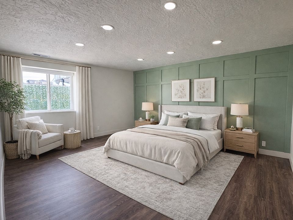Spacious master bedroom with abundant natural light, modern finishes, and a comfortable, open layout.