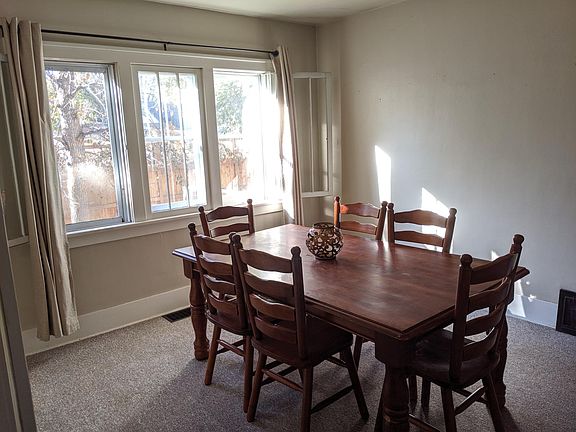 Dining room with south facing windows and french doors to living room (not shown)