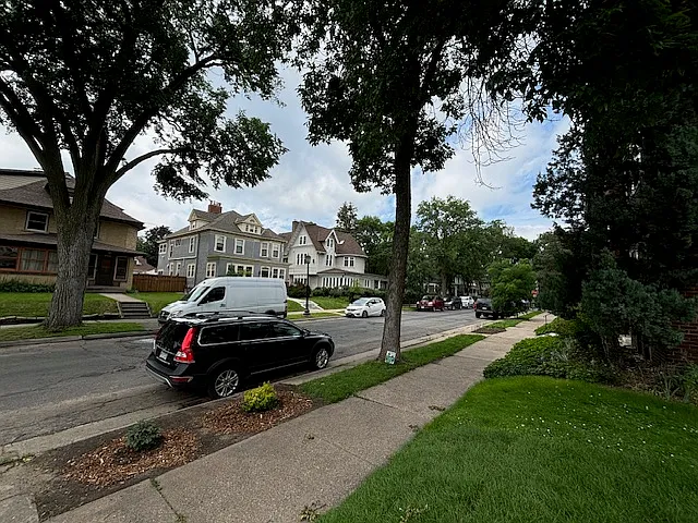 Girard Avenue in front of house showing ample parking.