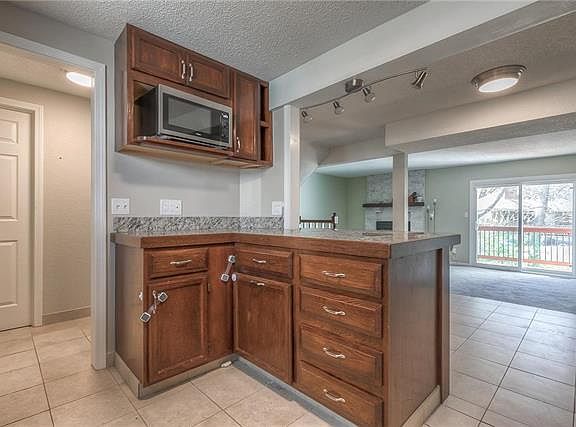 5th image of 11823 E 59th Terrace Cir