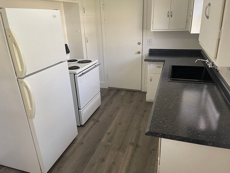 Kitchen with new flooring and countertops.